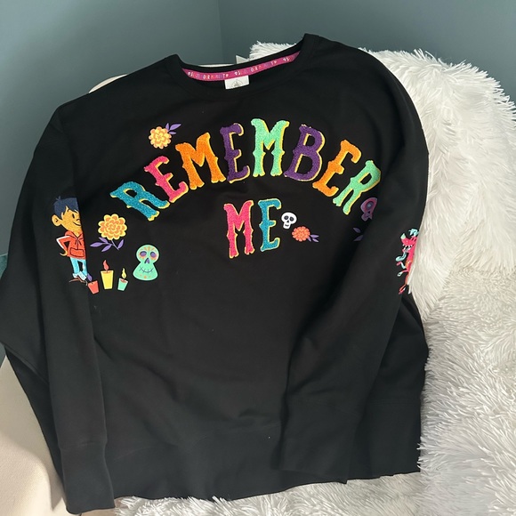 Disney Sweaters - SOLD Disney Coco Remember Me Embroidered Crew Neck Sweatshirt